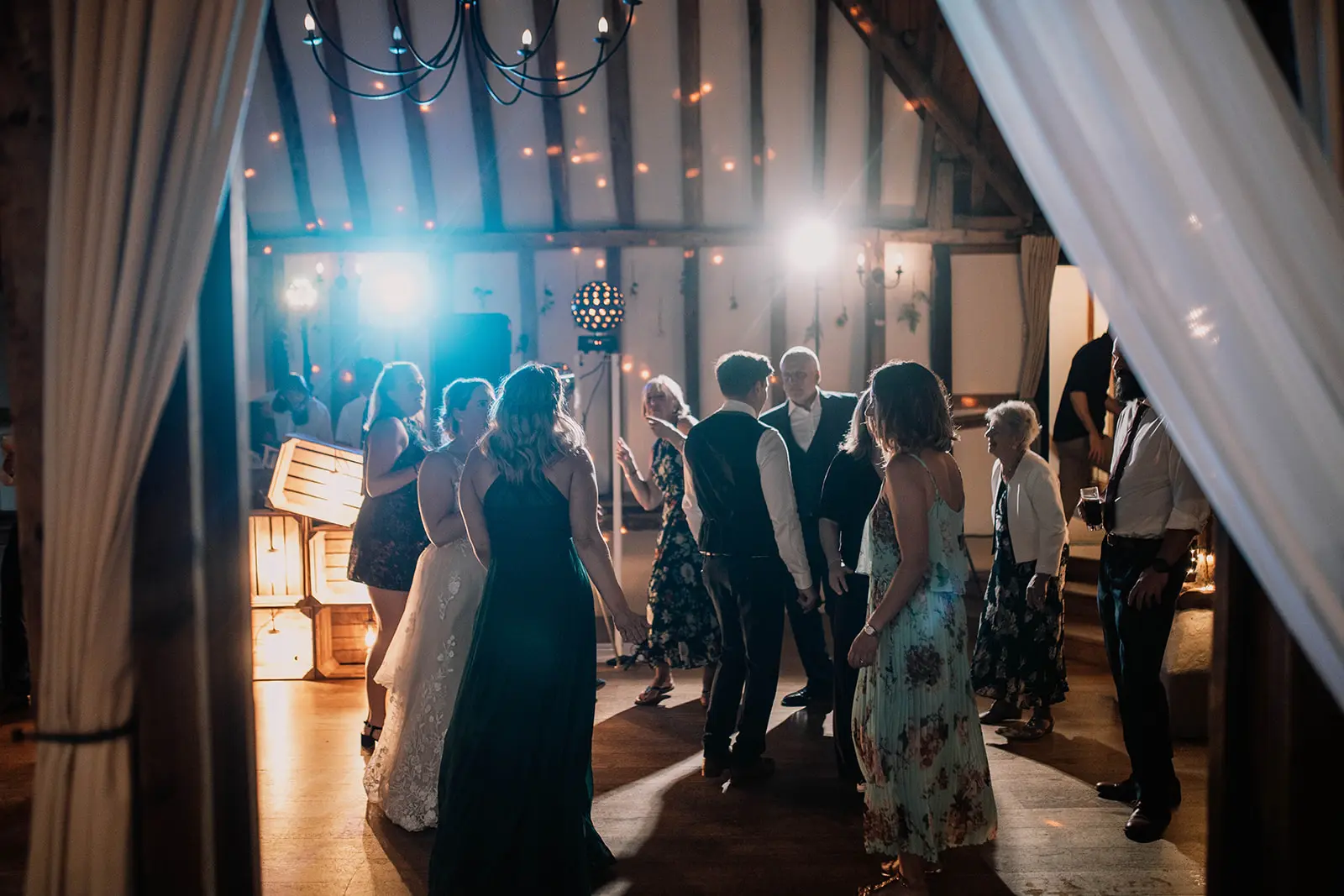 clock barn weddings guests dancing