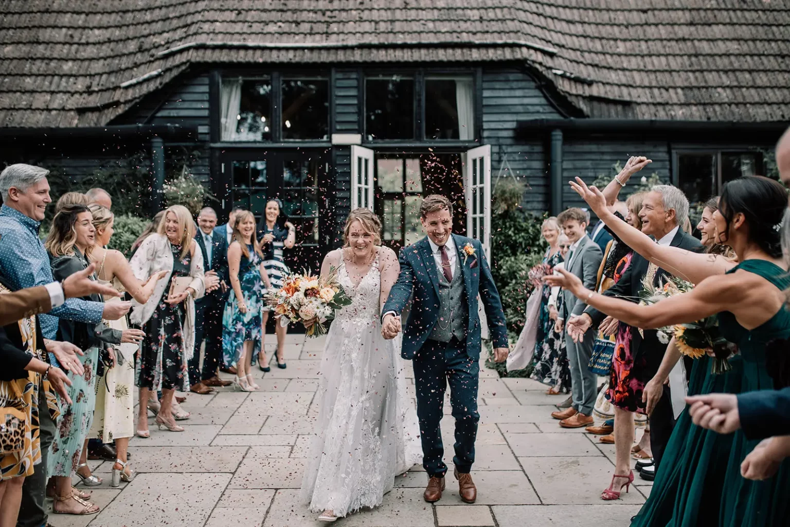 Clock Barn wedding ceremony confetti shot