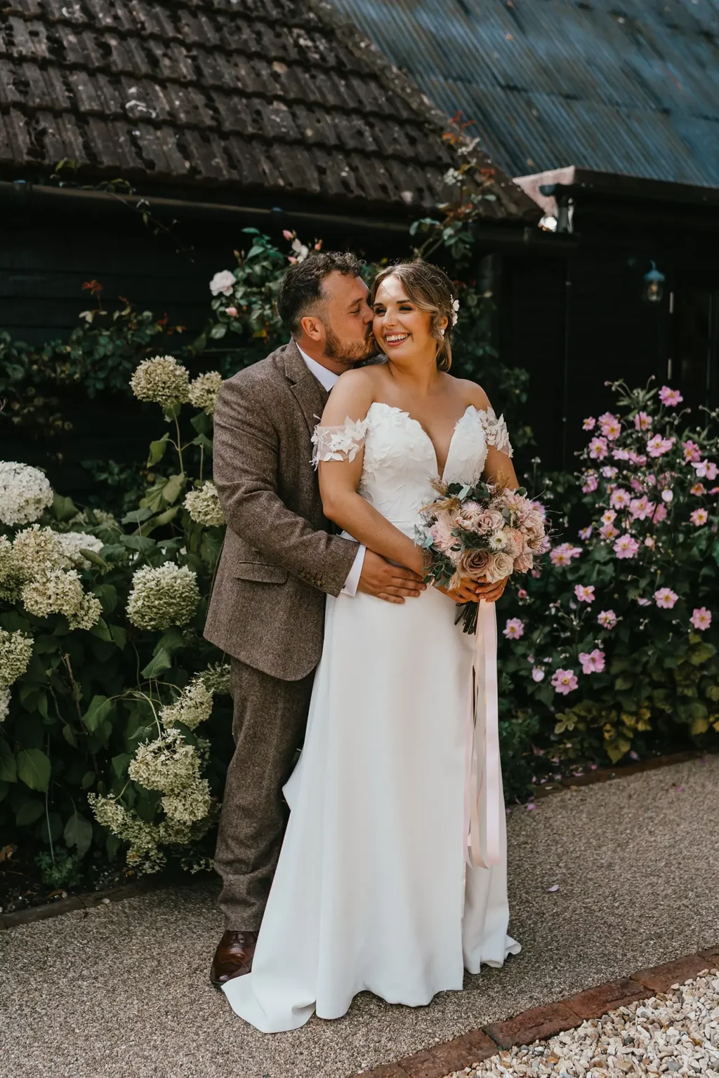 Clock Barn summer wedding bride and groom