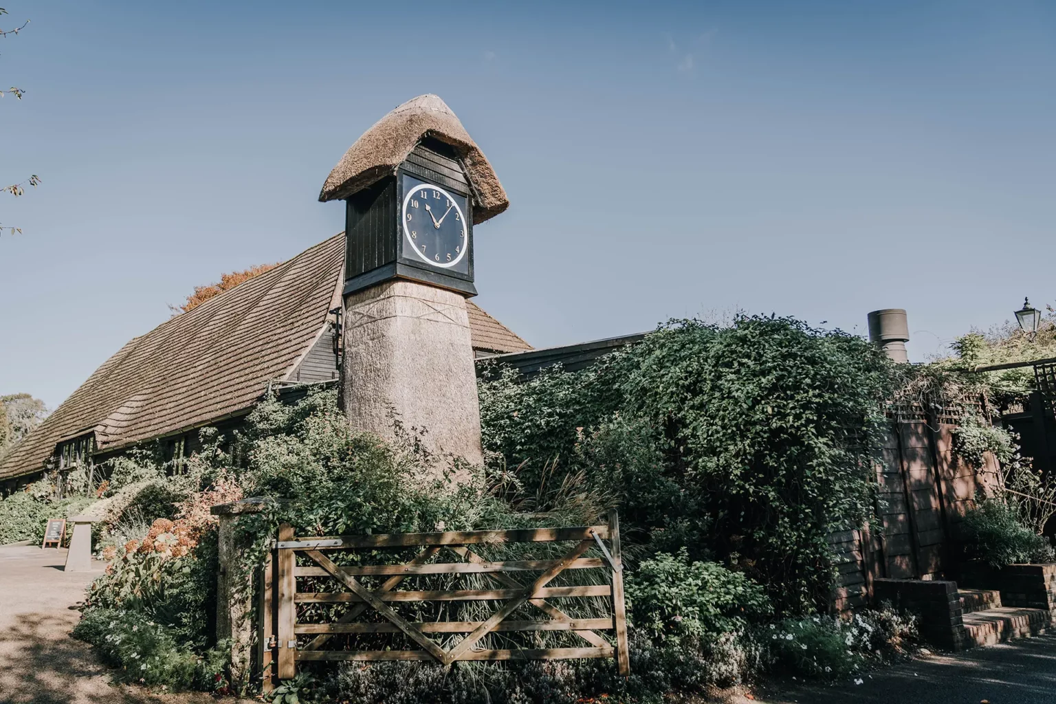 clock barn weddings entrance hero