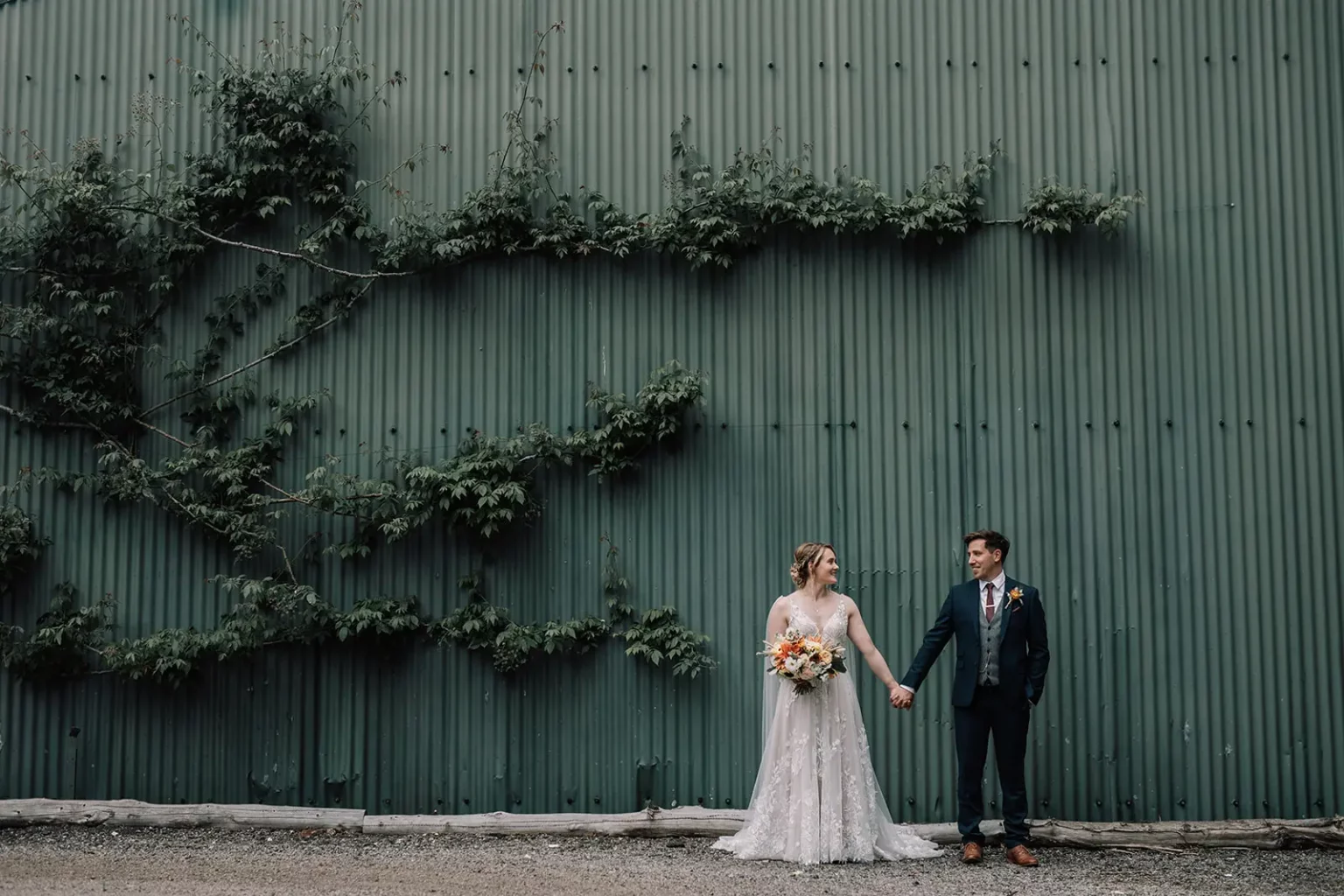 clock barn weddings couple