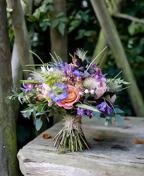 Clock Barn Hampshire colourful autumn wedding flowers