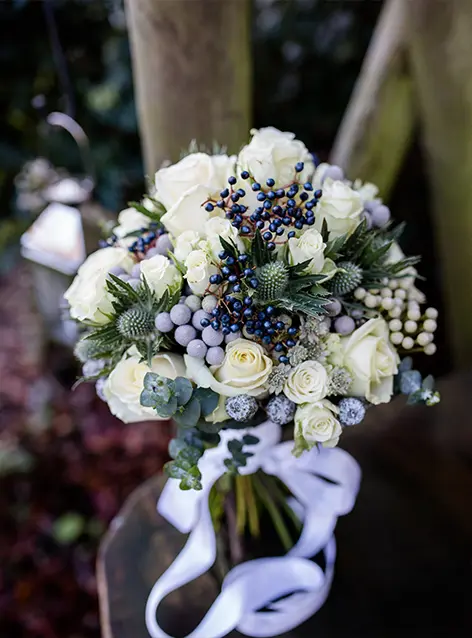 Clock Barn Hampshire pine cones seasonal wedding flowers