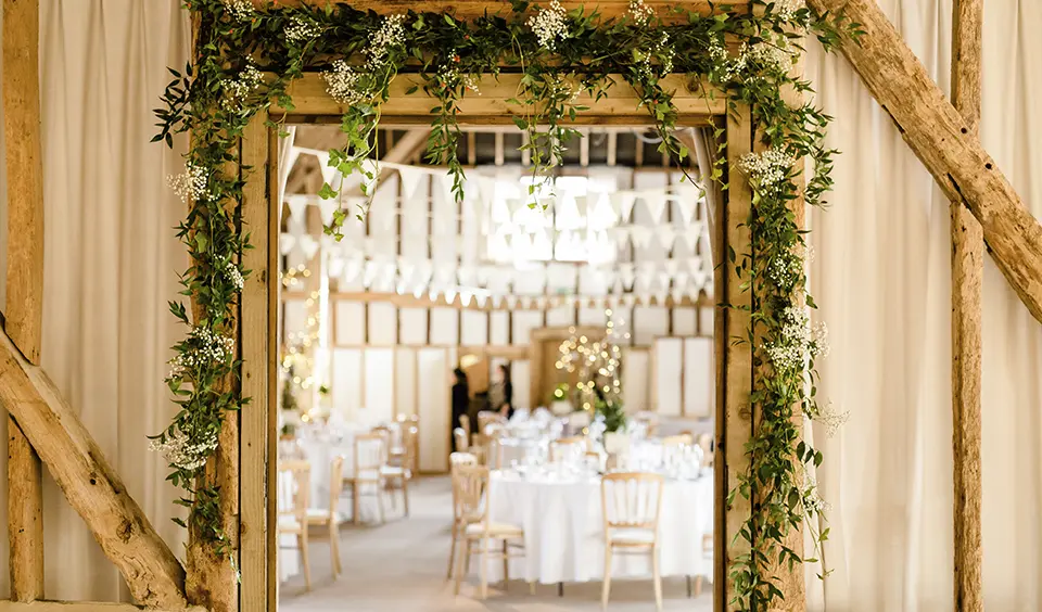 Clock Barn floral doorway seasonal wedding flowers