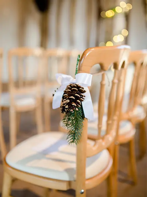 Clock Barn pine cones seasonal wedding flowers